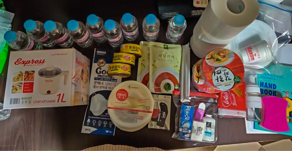ISSS sends a care package of necessities and food to returning international students