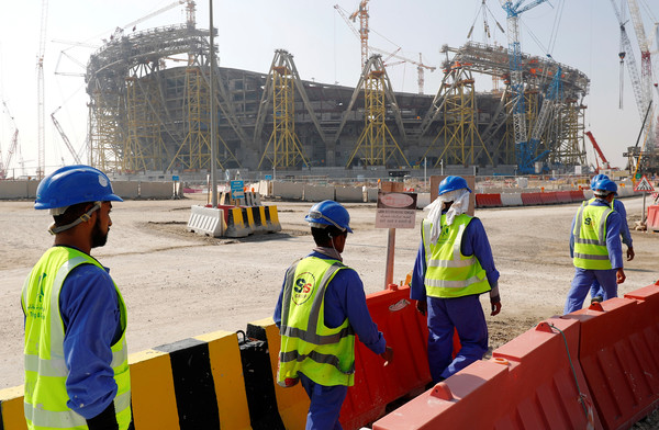 Migrant workers at the World Cup sites construction